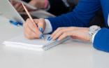 Woman transcribing meeting summaries